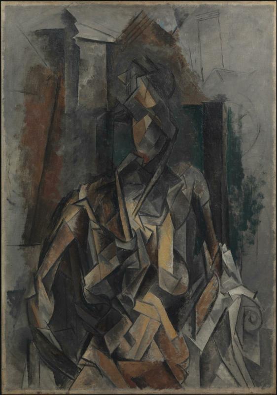 Femme assise dans un fauteuil