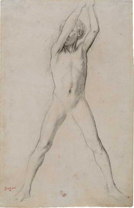 팔을 들어 올린 소년